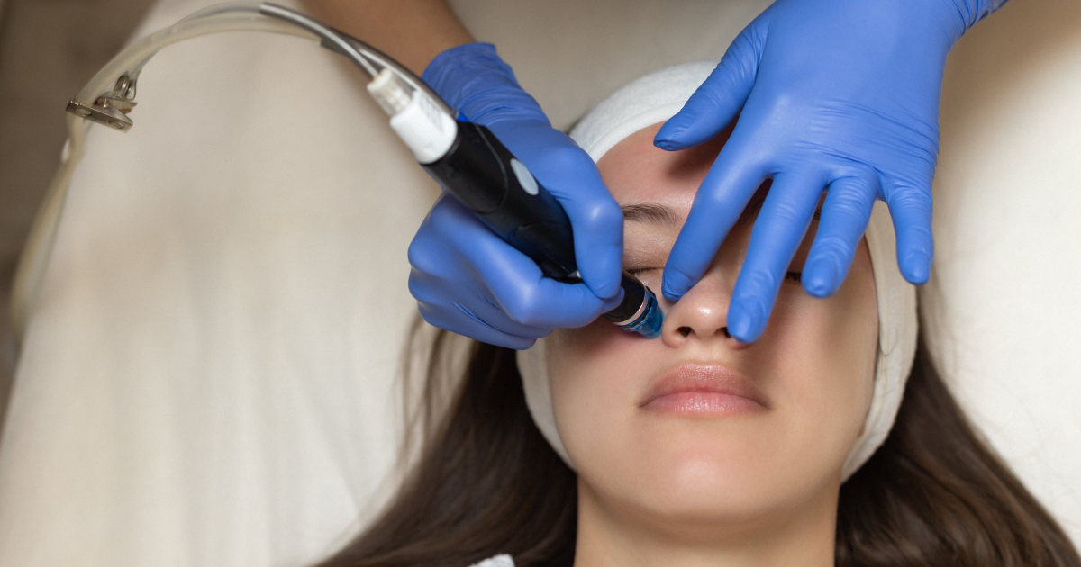 Woman receiving HydraFacials skin treatment in a spa clinic at Miramar Beach, FL