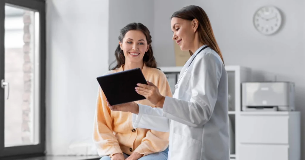 Female patient consulting with doctor about Bioidentical Hormone Replacement Therapy in Miramar Beach, FL